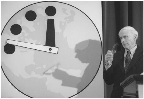 Doomsday clock's minute hand is moved to show the world that it is closer to a nuclear apocalypse. (AP/WIDE WORLD PHOTOS)